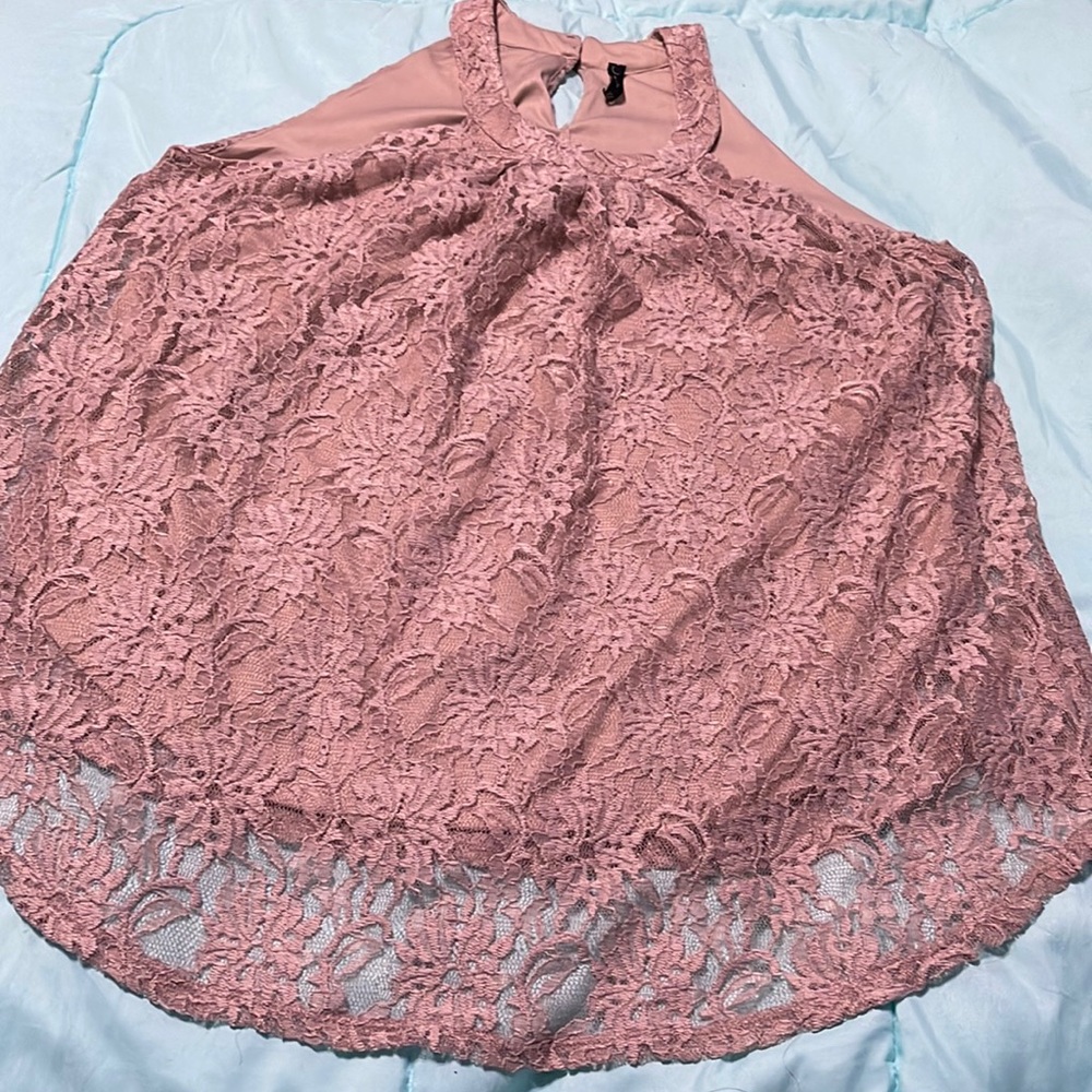 Beige like color blouse